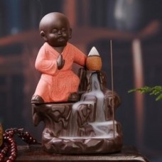 Deals, Discounts & Offers on  -  eCraftIndia Karate Style Red Monk Buddha Smoke Backflow Cone Incense Holder Decorative Showpiece with 10 free Smoke Backflow Scented Cone Incenses