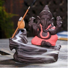 Deals, Discounts & Offers on  - Craft Junction Handcrafted Lord Ganesha Smoke Backflow Cone Incense Holder With 10 Incense Cones Decorative Showpiece - 9.5 cm(Polyresin, Multicolor)