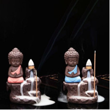 Deals, Discounts & Offers on  - Craft Junction Handcrafted Meditating Little baby Monk Buddha Smoke Backflow Cone Incense Holder With 20 Incense Cones Decorative Showpiece - 12 cm(Polyresin, Red, Blue)