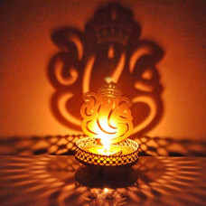 Deals, Discounts & Offers on  - Heaven Decor Metal Shadow Ganesha Tealight Candle Holder, Pack of 1