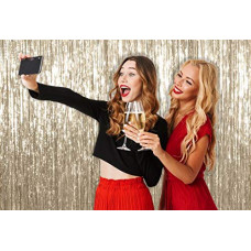 Deals, Discounts & Offers on  - Treasures Gifted Pale Champagne Metallic Tinsel Foil Fringe Backdrop Curtain (Bright Gold, 3 x 8 Feet, Pack of 3)