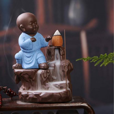 Deals, Discounts & Offers on  - eCraftIndia Karate Style Monk Buddha Decorative Showpiece with 10 Free Smoke Backflow Scented Cone
