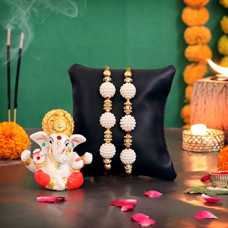 Deals, Discounts & Offers on  - TIED RIBBONS Set of 2 Designer Rakhi For Brother with Figurine and Roli Chawal Tika