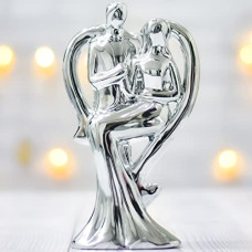 Deals and Offers on - ARCHIES Lovers Polyresin Couple Statue | Showpiece | Gifting Item for Valentine's Day | Birthdays | Decoration | Ideal Deals, Discounts & Offers on - ARCHIES Lovers Polyresin Couple Statue | Showpiece | Gifting Item for Valentine's Day | Birthdays | Decoration | Ideal