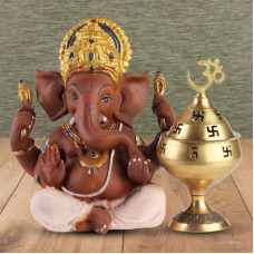 Deals, Discounts & Offers on  - Ferns N Petals Brown Ganesha Idol With Om Akhand Diya For Diwali Decorative Showpiece - 14 cm(Polyresin, Multicolor)