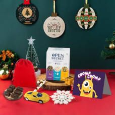Deals, Discounts & Offers on  - Open Secret Christmas & New Year Gifts for Kids | 8 Item Gift Combo - Kids Card, Chocolate Basket/Potli (Pack of 3), Assorted Story Box (6 Cookies), Kids Toy | Secret Santa Gifts | Gift Box
