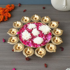 Deals, Discounts & Offers on  - eCraftIndia Golden Metal Handcrafted Designer Urli with 13 Diyas - Elegant Home Decor Centerpiece,