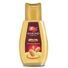 Deals, Discounts & Offers on  - Dabur Almond Hair Oil With Almonds , Soya Protein And Vitamin E For Non Sticky , Damage Free Hair - 500Ml