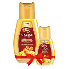Deals, Discounts & Offers on  - Dabur Almond Hair Oil - 500ml with Dabur Almond Hair Oil- 200ml free | Provides Damage Protection | Non Sticky Formula | For Soft & Shiny Hair | With Almonds , Soya Protein & Vitamin E