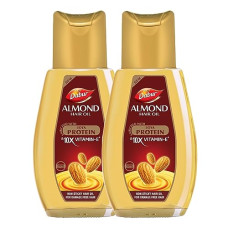 Deals, Discounts & Offers on Beauty Care - Dabur Almond Hair Oil - 580ml(290ml*2) | Provides Damage Protection | Non Sticky Formula | For Soft & Shiny Hair | With Almonds, Keratin Protein, Soya Protein & 10X Vitamin E
