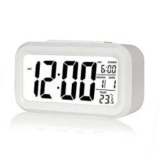 Deals, Discounts & Offers on  - Digital Alarm Clock,Battery Operated Small Desk Clocks,with Date,Indoor Temperature,Smart Night Light,LCD Electronic Clock
